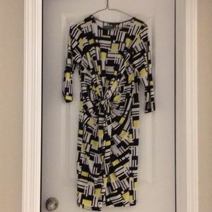 Yellow, black, and white dress